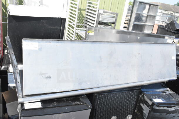 Metal two-shelf unit, slightly worn condition, label indicating auction details, potential for doubling bid.