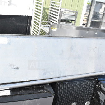 Metal two-shelf unit, slightly worn condition, label indicating auction details, potential for doubling bid.