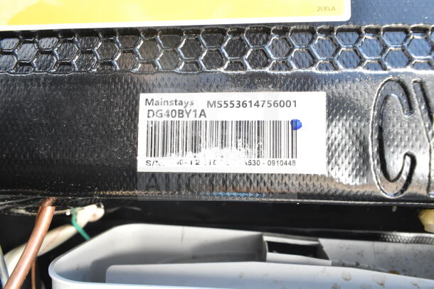 Barcode and label close-up on a mini cooler, featuring Mainstays model MS553614756001, DG40BY1A.