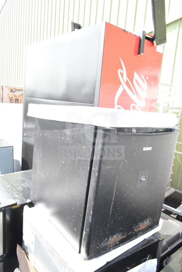 Five mini coolers, including a Galanz model, shown in various conditions. Includes 115 volts, 1 phase.