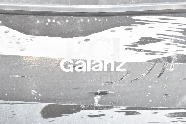 Four mini coolers, including Galanz, 115 volts, 1 phase, black, light wear, branding visible. Auctioned as a lot.