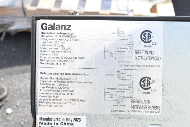 Galanz mini cooler label detailing model GLR25MBKE02, 2.5 cu. ft. capacity, 120 VAC, made in May 2023, free-standing.
