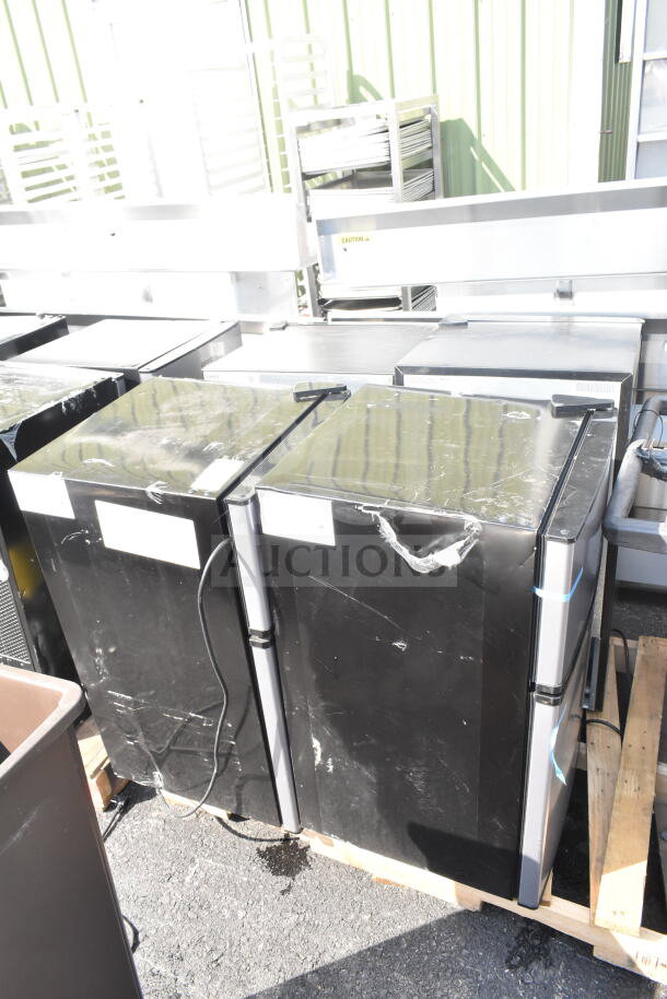 Four various mini coolers, including Galanz brand, on display. 115 volts, 1 phase. Sold as a group of four.