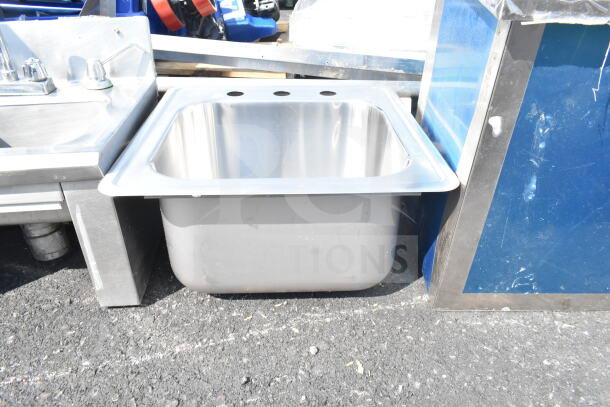 Stainless steel single bay drop-in sink, new, with three faucet holes, ideal for kitchen installations.