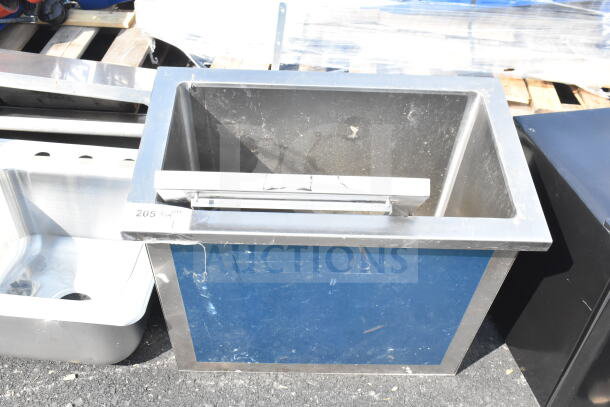 Commercial drop-in ice bin, stainless steel, used condition, visible surface wear, marked "205" for identification.