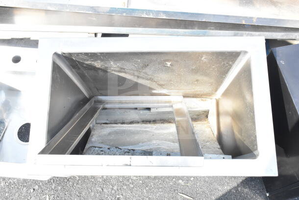 Commercial Ice Bin Drop In, stainless steel, open top view, used condition, with visible interior wear marks.