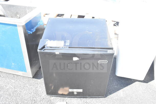 Whynter CUF-110 Mini Freezer, black, visible scratches, 115 Volts, 1 Phase, label shows brand and model.