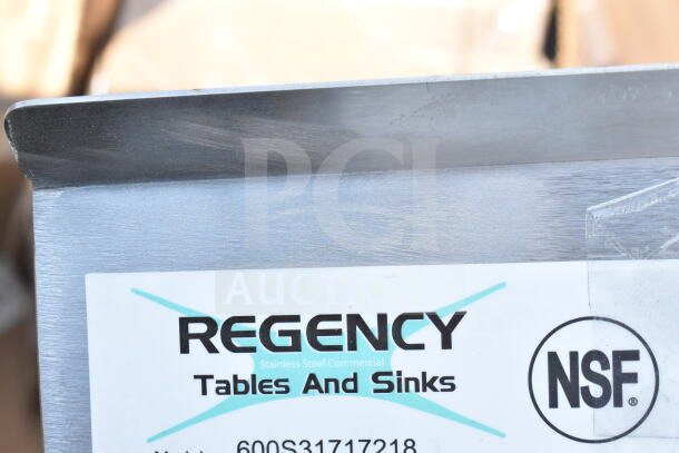 NSF certified Regency 600S31717218 commercial 3-bay sink with dual drain board. Brand new, slight scratches and dents.