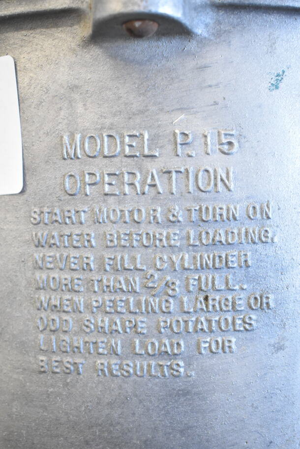 P15 Commercial Potato Peeler Barrel, Model P15, with operational guidelines embossed on metal surface.