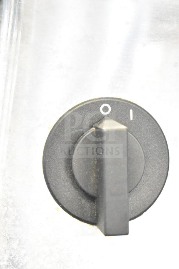 Dial control of Omcan GR-IT-0746 cheese grater, showing on/off positions. Ideal for commercial use, 110 volts, 1 phase.