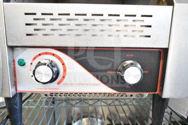 Commercial electric conveyor toaster oven, model BI006192, 110 volts, 1 phase. Features control knobs and vented front.