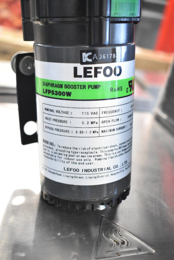 Brand new Estella Caffe 236PMS12 diaphragm pump, 115V, 1-phase. Visible label: LEFOO LFP5300W. Scratch and dent condition.