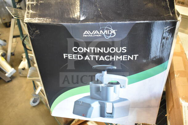 Brand new AvaMix Revolution 928CFEED continuous feed attachment in original box, minor box wear noted.