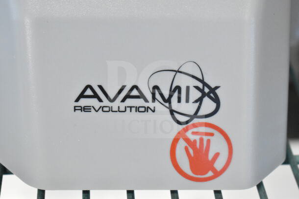 BRAND NEW AvaMix Revolution 928CFEED continuous feed attachment, logo visible on surface, minor scratch and dent condition.
