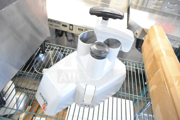 Brand new AvaMix Revolution 928CFEED continuous feed attachment with minor scratches. Durable and efficient design.
