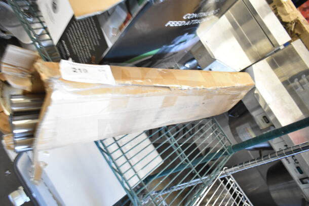 Box of 4 posts in damaged packaging, labeled "BRAND NEW SCRATCH AND DENT." Includes visible metal posts.