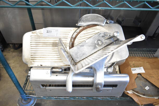 Toledo 5401 Commercial Meat Slicer with Blade Sharpener, 110V, 1 Phase. Features rust on blade guard, visible use wear.