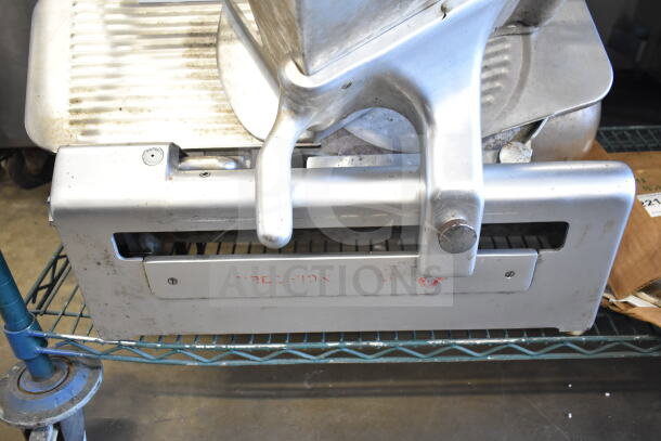 Toledo 5401 Commercial Countertop Meat Slicer with blade sharpener, 110V, 1 phase, silver, and used condition.
