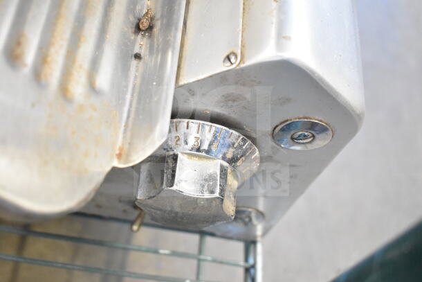 Toledo 5401 Commercial Meat Slicer with blade sharpener, visible dial, 110V, 1 Phase. Signs of wear and use.