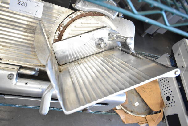 Toledo 5401 Commercial Meat Slicer with Blade Sharpener, countertop model, 110 volts, 1 phase, used condition.