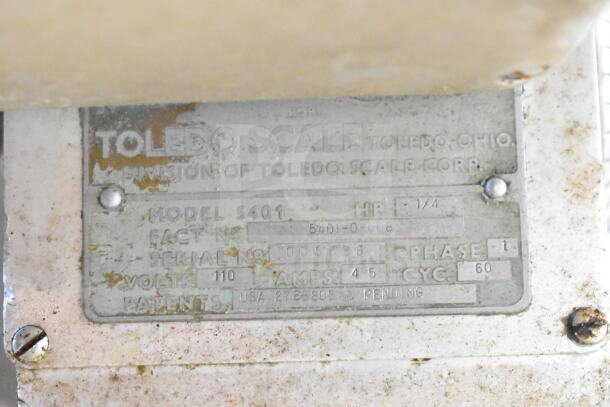 Toledo 5401 Commercial Meat Slicer ID plate showing model, serial number, 110V, 1-phase, and sharpener details.