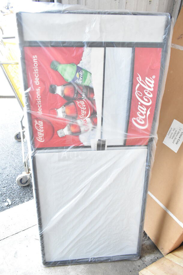 Brand new menu board, minor scratches and dents. Features Coca-Cola branding, includes changeable letter slots.