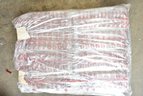 Brand new menu board, wrapped in plastic, with visible red numbers. Scratch and dent condition.