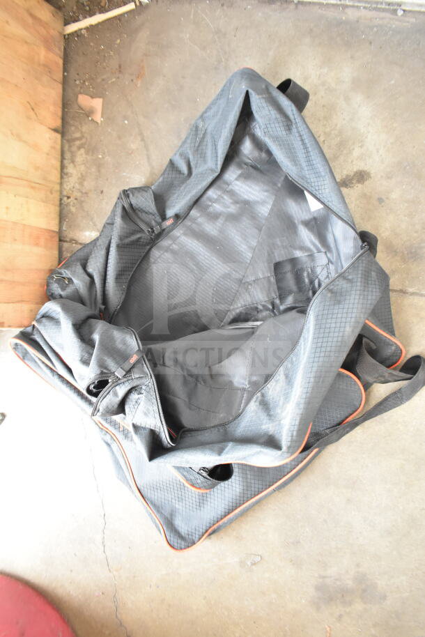 Loco Cookers Bag, grey with orange trim, large capacity, zippered compartments, used condition, visible wear.