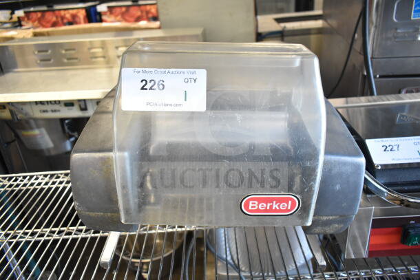Berkel 705 electric meat tenderizer, 115V, 1 phase, commercial countertop model. Visible brand label and auction tag.