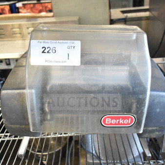 Berkel 705 electric meat tenderizer, 115V, 1 phase, commercial countertop model. Visible brand label and auction tag.