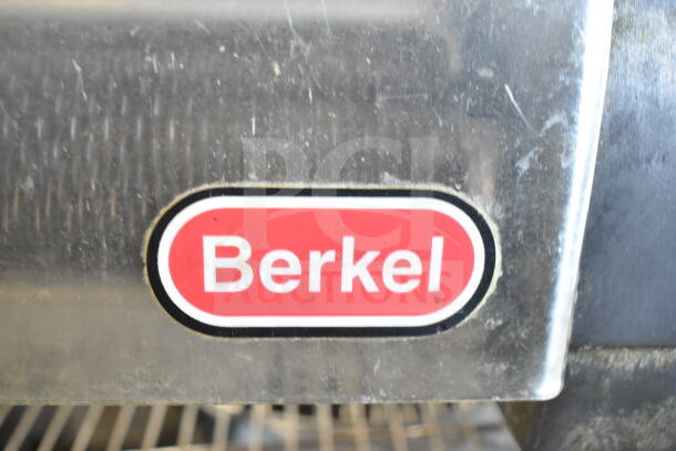 Berkel 705 meat tenderizer, commercial electric countertop model, uses 115 volts, 1 phase. Features Berkel logo.