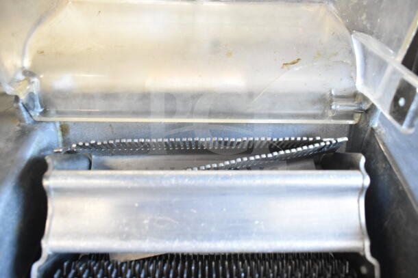 Berkel 705 commercial electric meat tenderizer, 115 volts, countertop model, visible tenderizing blades, used condition.