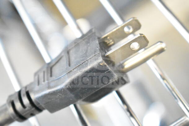 Close-up of a power plug for the Eggkitpo EGG-813EB Commercial Double Panini Press, 110 Volts, 1 Phase.
