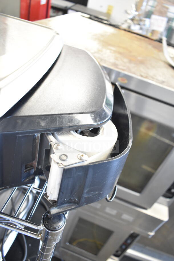 2017 Hobart HTs-7LST commercial portioning scale, countertop model. Includes roll holder, 120/208-240V, tested and working.