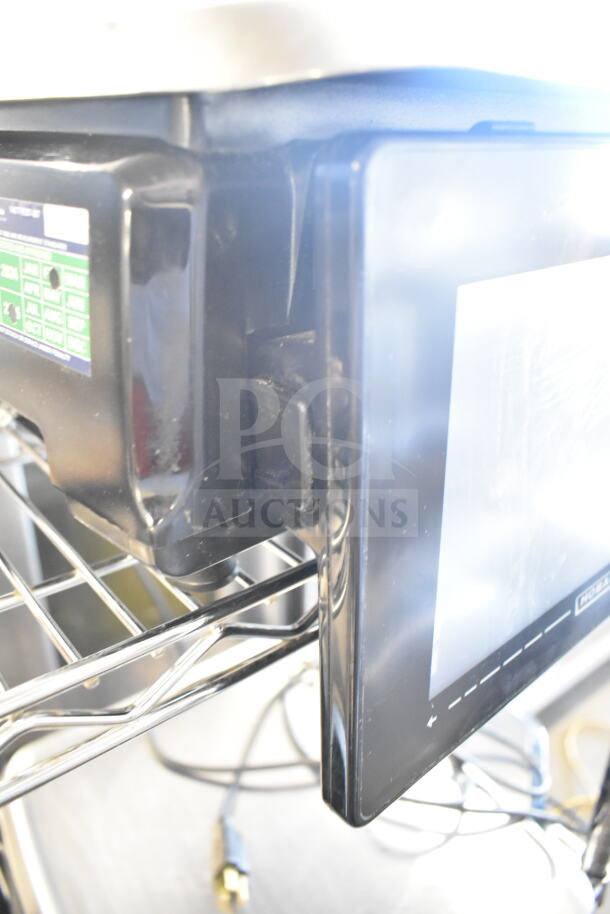 2017 Hobart HTs-7LST commercial food portioning scale, black, tested, working, 120/208-240 volts, 1 phase.