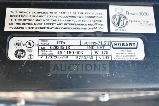 2017 Hobart HTs-7LST Commercial Scale, 120/208-240V, 1 Phase, tested working. Features model info and compliance labels.