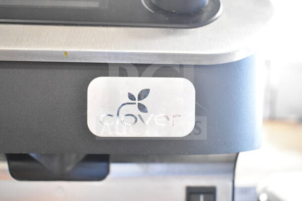 Clover Countertop Single Group Espresso Machine, 200-240 Volts. Features a sleek design with the Clover logo on its front panel.
