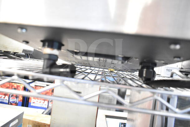 Clover Countertop Single Group Espresso Machine, underside view, 200-240 volts, showing installation components.