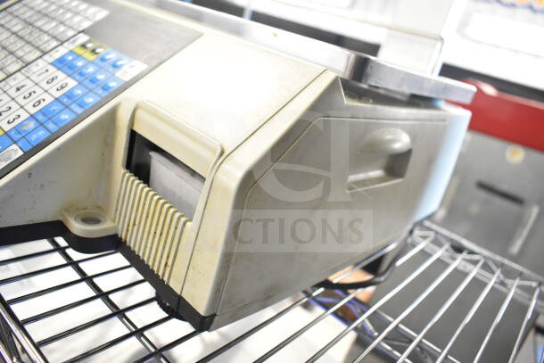 CAS CL5000-R commercial countertop scale, 60 lb capacity, 120V, 1 Phase, keypad and printer visible, in used condition.