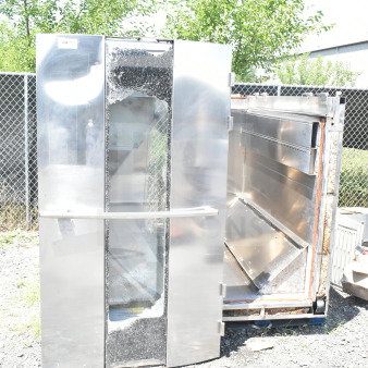 Hobart Commercial Roll In Rack Oven, stainless steel, damaged glass, outdoor setting, visible wear, industrial use.