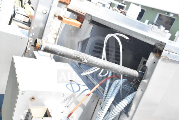 Hobart Commercial Roll In Rack Oven, showing interior mechanics, metal exterior, and attached wiring in used condition.