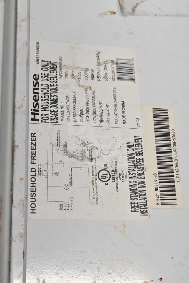 Hisense WFC050M6XWD Chest Freezer with labels. 115V, 1 Phase. Visible label shows electrical specifications and model info.