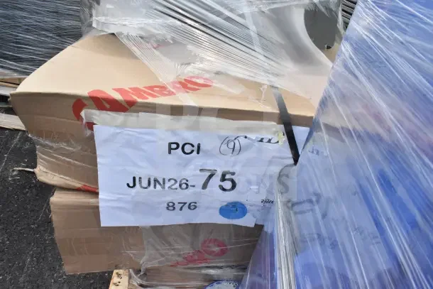 4 new scratch and dent items, including JUN26-75 grease trap and hotel pans, wrapped for auction. Visible tags: JUN26-75.