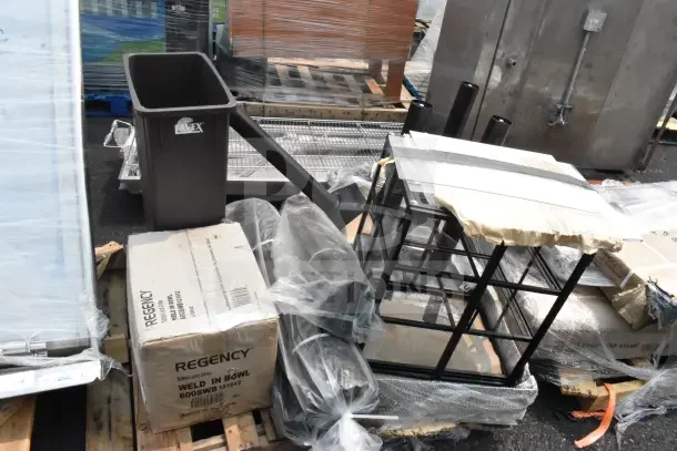 10 brand new scratch and dent items including anti-fatigue mats and Regency sink on pallets, featuring Avalex container.