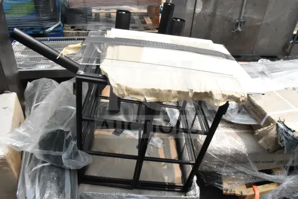 10 brand new scratch and dent items including anti-fatigue floor mats and a sink, partially packaged, visible wear on packaging.