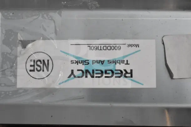 Regency 600DDTI60L stainless steel L-shape soiled dishtable, brand new, scratch and dent, model tag visible, NSF certified.