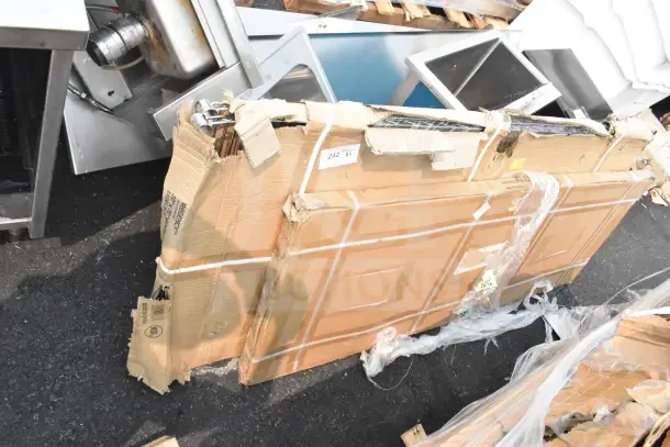 4 brand new scratch and dent items, includes drop mat and wire shelf, visible packaging wear, auction lot labeled "242 NY."