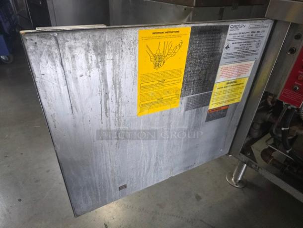 Crown GCX-10-24 natural gas convection steamer, 2 compartments, 24" cabinet, 10 pan capacity, 200,000 BTUs. Visible instructions and warnings.