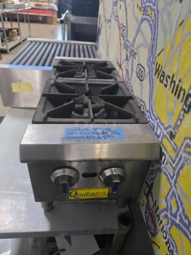 Qualite QLH-12 gas hotplate with 2 burners, 50,000 BTU, stainless steel, visible brand label, good condition.