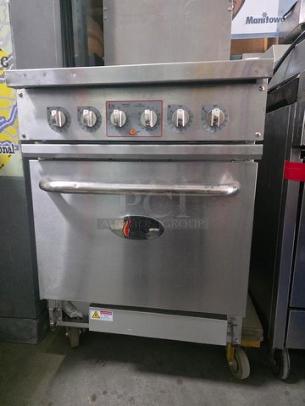 24" CPG 4-burner electric range with space saver oven, 208V, 3 PH. Features control knobs, bent bottom cover.
